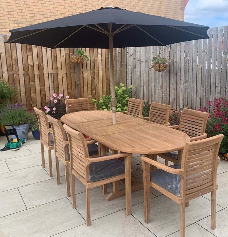 Teak garden dining set is amazing value - double extending table 1.8m to 2.4m, 8 x teak stacking chairs, free 3m parasol and cushions